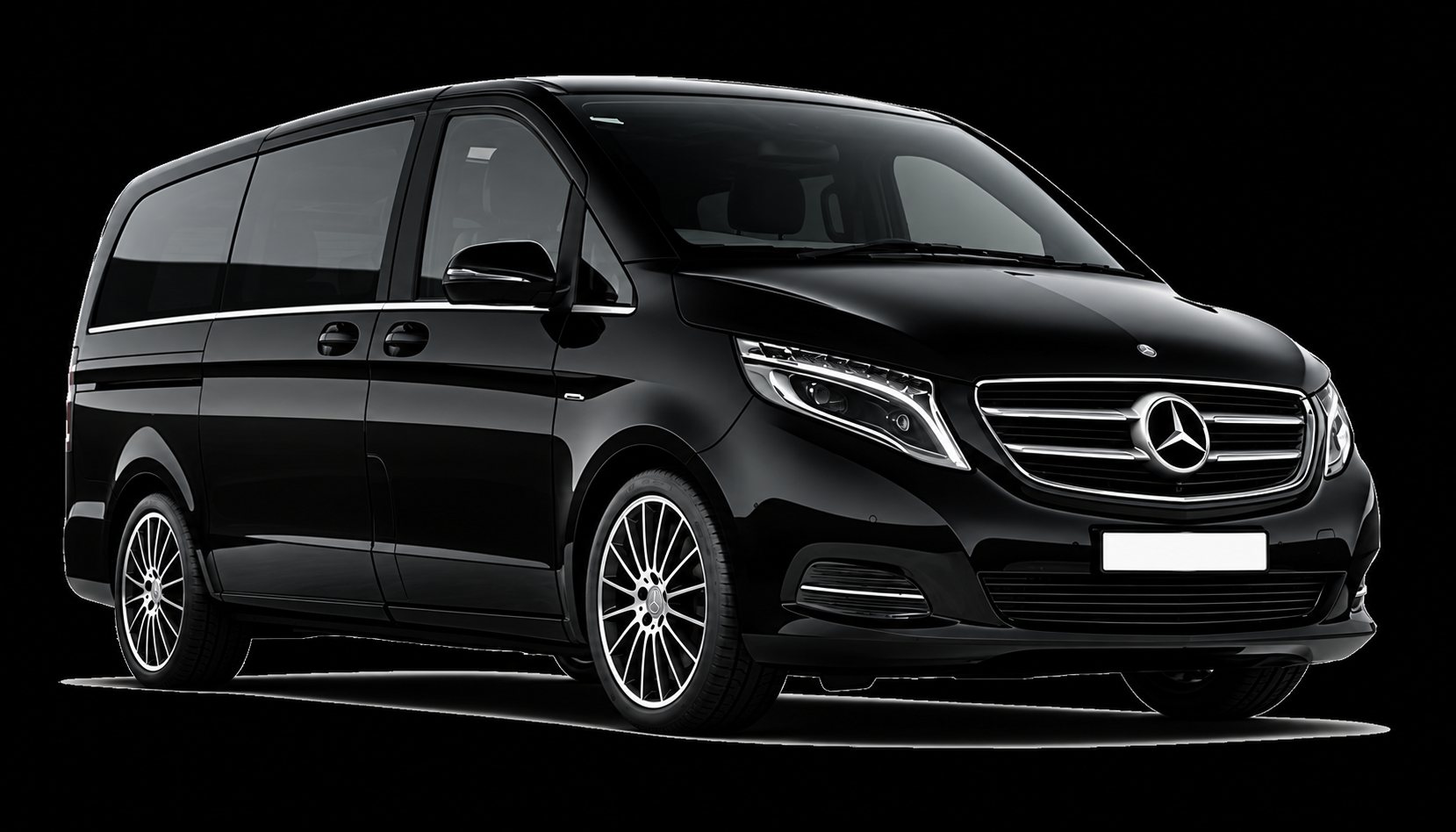 Un monospace Mercedes noir, de type Classe V, photographié de trois quarts avant.